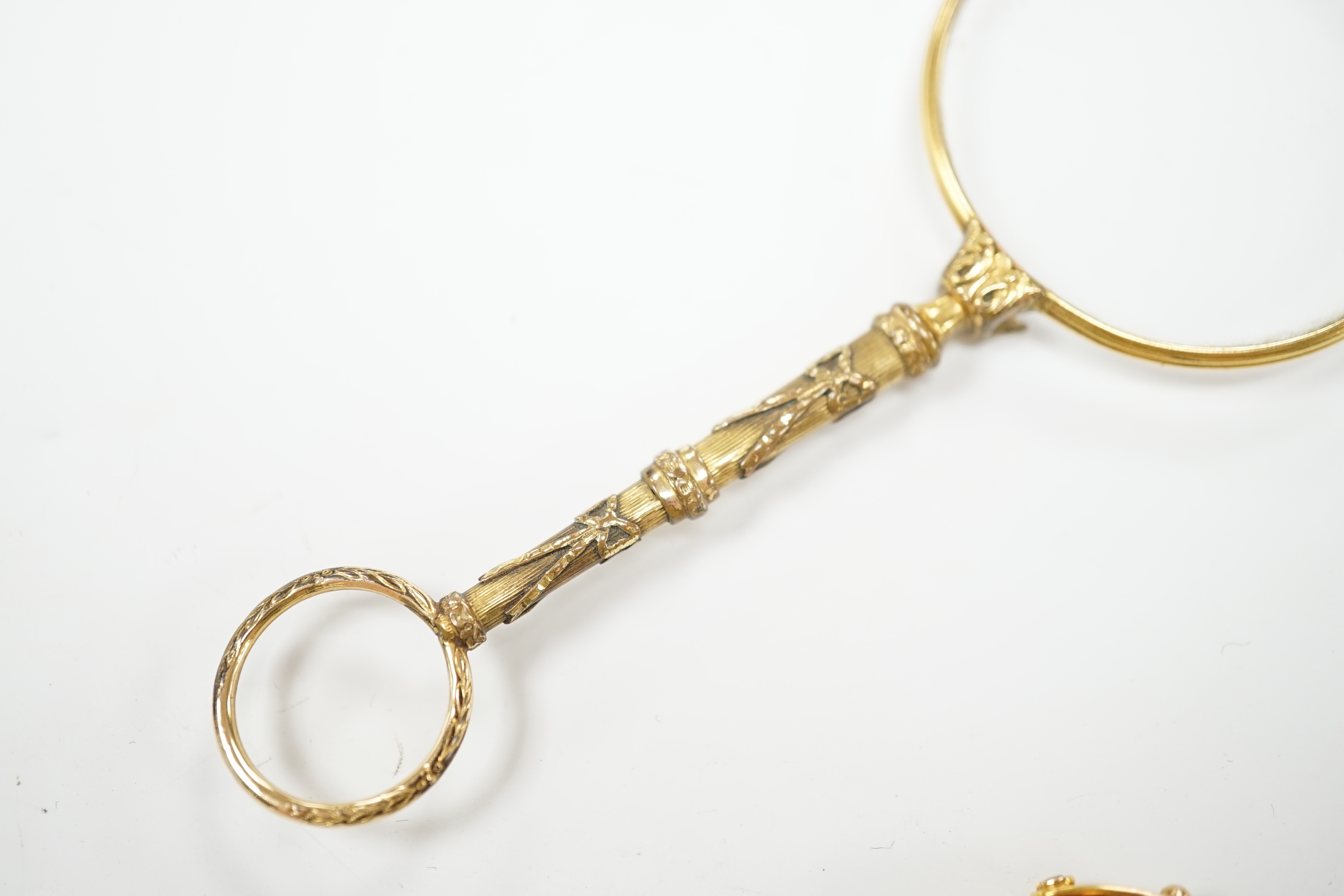 A George V 9ct gold mounted carnelian and bloodstone set spinning fob, width 21mm, together with a pair of gold plated lorgnettes.